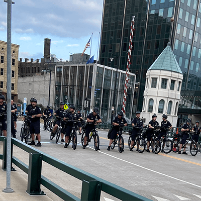 A team of police cyclists monitoring the security perimeter.